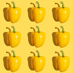 Seamless pattern with bell pepper on yellow background.