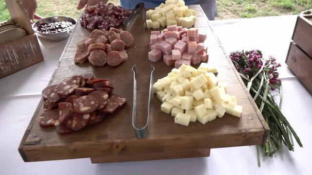 A charcuterie and cheese table for a social event.