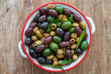 Marinated green and black olives. Mediterranean food.