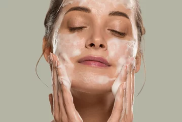 Photo sur Plexiglas Spa Soap face woman clean skin beauty. Color background. Green