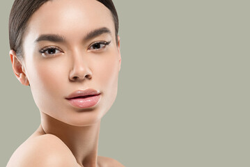 Fototapeta premium Asian woman beauty healthy skin care and beautiful hair female model portrait Color background green