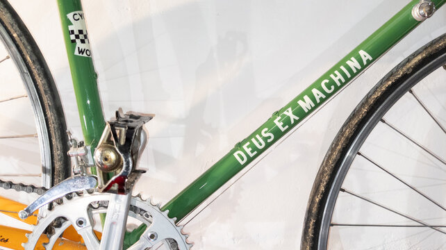 Deus ex Machina bicycle logo brand and sign text on cycle custom green