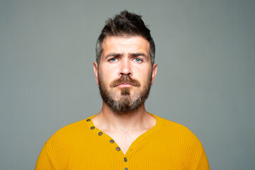 Fototapeta premium Serious bearded man. Sad emotion. People expressions and emotions.