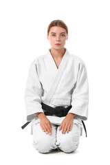 Female karate instructor on white background © Pixel-Shot
