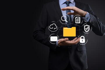 Document Management System DMS .Businessman hold folder and document icon.Software for archiving,...