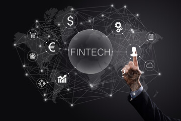 Businessman hold Fintech -financial technology concept.Business investment banking payment. Cryptocurrency investment and digital money. Business concept on virtual screen.
