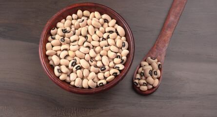 Uncooked black eyed peas. Health food concept.