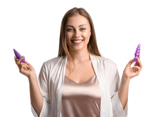 Young woman with anal plug sex toys on white background