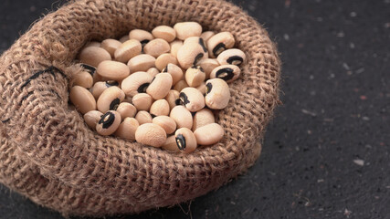 Uncooked black eyed peas. Health food concept.