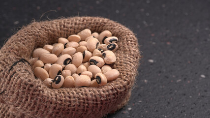 Uncooked black eyed peas. Health food concept.