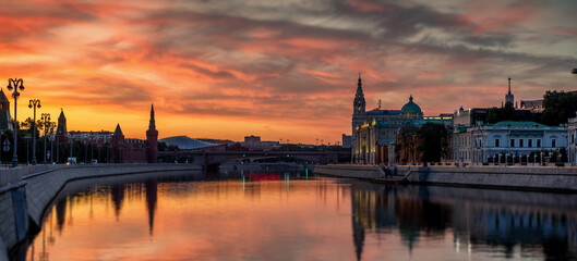 Fototapeta na wymiar Sunrise over Moscow and the river, beautiful city landscape, panorama landscape. Travel to Russia