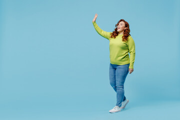 Full body friendly happy young chubby overweight plus size big fat fit woman wear green sweater...