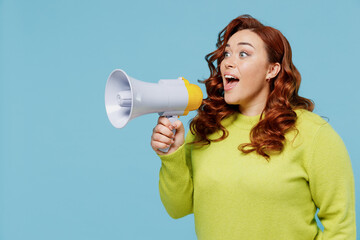 Young expressive chubby overweight plus size big fat fit woman wear green sweater hold scream in...