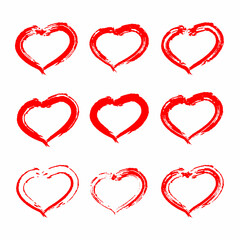 Set of red hearts isolated on white background. Decorative design elements for Valentine's Day. Drawing  brush shape of heart