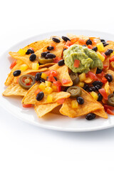 Mexican nachos tortilla chips with black beans, guacamole, tomato and jalapeno isolated on white background