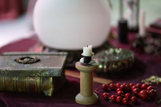 Photo of a table with objects for astrology and fortune-telling.