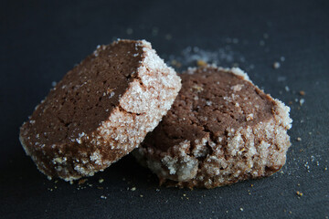 chocolate shortbread cookies on a dark background
