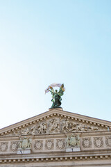 Sculptures adorn front of Lviv Opera and Ballet Theater. Lviv, Ukraine, June to 6 July 2021