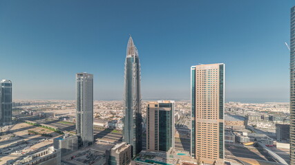 Fototapeta na wymiar Sky view to skyscrapers and hotels in Dubai downtown aerial timelapse.