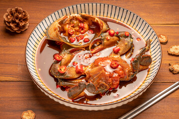 Korean Soy Sauce Pickled Crab, Fresh raw crabs marinated in a mild soy sauce, Ganjang Gejang Korean traditional food.