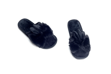 The black female slippers on a white background