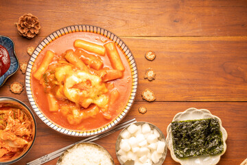 Spicy Rice Cake with Cheese or Teokbokki with spicy sauce Korean traditional food, Tteokbokki is...