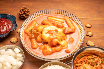 Spicy Rice Cake with Cheese or Teokbokki with spicy sauce Korean traditional food, Tteokbokki is Korean rice cake stick in spicy sauce Korean cuisine dish.