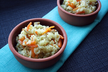 Flavorful pilaf of rice, carrots and chicken.