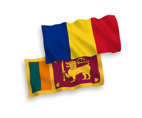 National vector fabric wave flags of Romania and Sri Lanka isolated on white background. 1 to 2 proportion.
