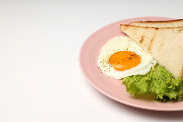 Plate with tasty breakfast on white background