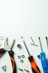 Work tools on white background, top view