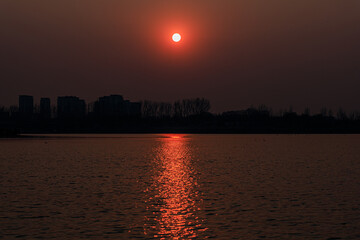 child sunset view and building golden view 