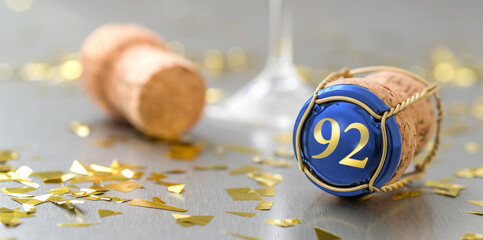 Champagne cap with the Number 92