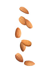 Many tasty almonds falling on white background