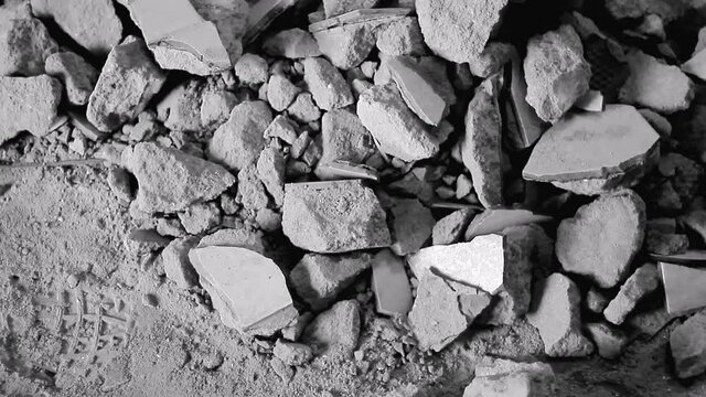 broken stones and boulders on a building site stock video