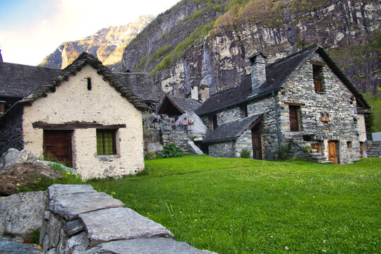 Stone houses an Waterfall Val Bavona, Cevio in Switzerland spring 2021