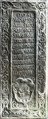 Ancient stone with medieval latin writing. Ancient church