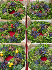 Christmas wreaths in boxes at a Christmas Market 