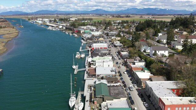 Cinematic 4K aerial drone dolly clip of Swinomish Village, Swinomish Channel and La Conner on a native American indian tribal reservation in Washington