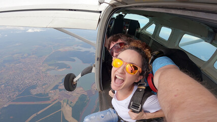 Skydive tandem selfie above Itaípu Dam, between Brazil and Paraguay. - 477626458
