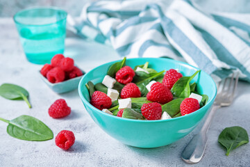 Spinach raspberry Feta salad in a bowl