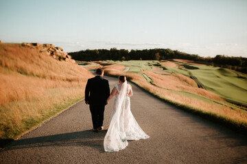 Bride and Groom walking together 