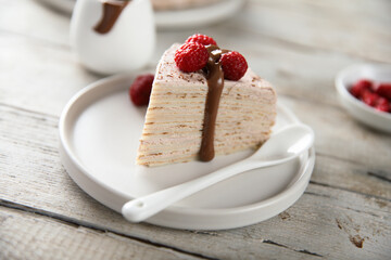 Homemade crepes cake with raspberry cream