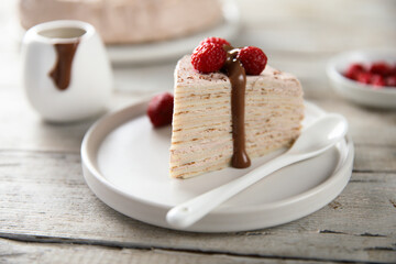 Homemade crepes cake with raspberry cream