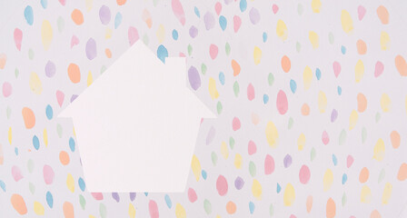White houses shaped and multicolored dots.homeless housing and home protection insurance concept, international day of families, foster home care,kids,and family.