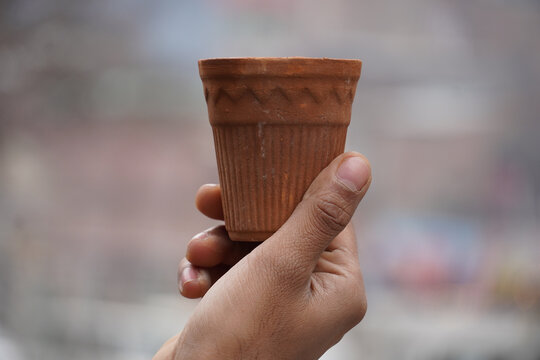 a cup of kulhar chai in morning images