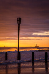 Sunrise to start the day at Blyth beach in Northumberland, with St Mary's Lighthouse in the distance
