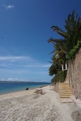Fototapeta na wymiar Stairs leading directly to the beach in Shela, Lamu Island