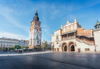 Naklejka na ściany i meble Town Hall Tower and Cloth Hall at Main Market Square - Krakow, Poland