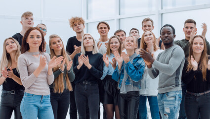 group of young people applauding . photo with copy space.